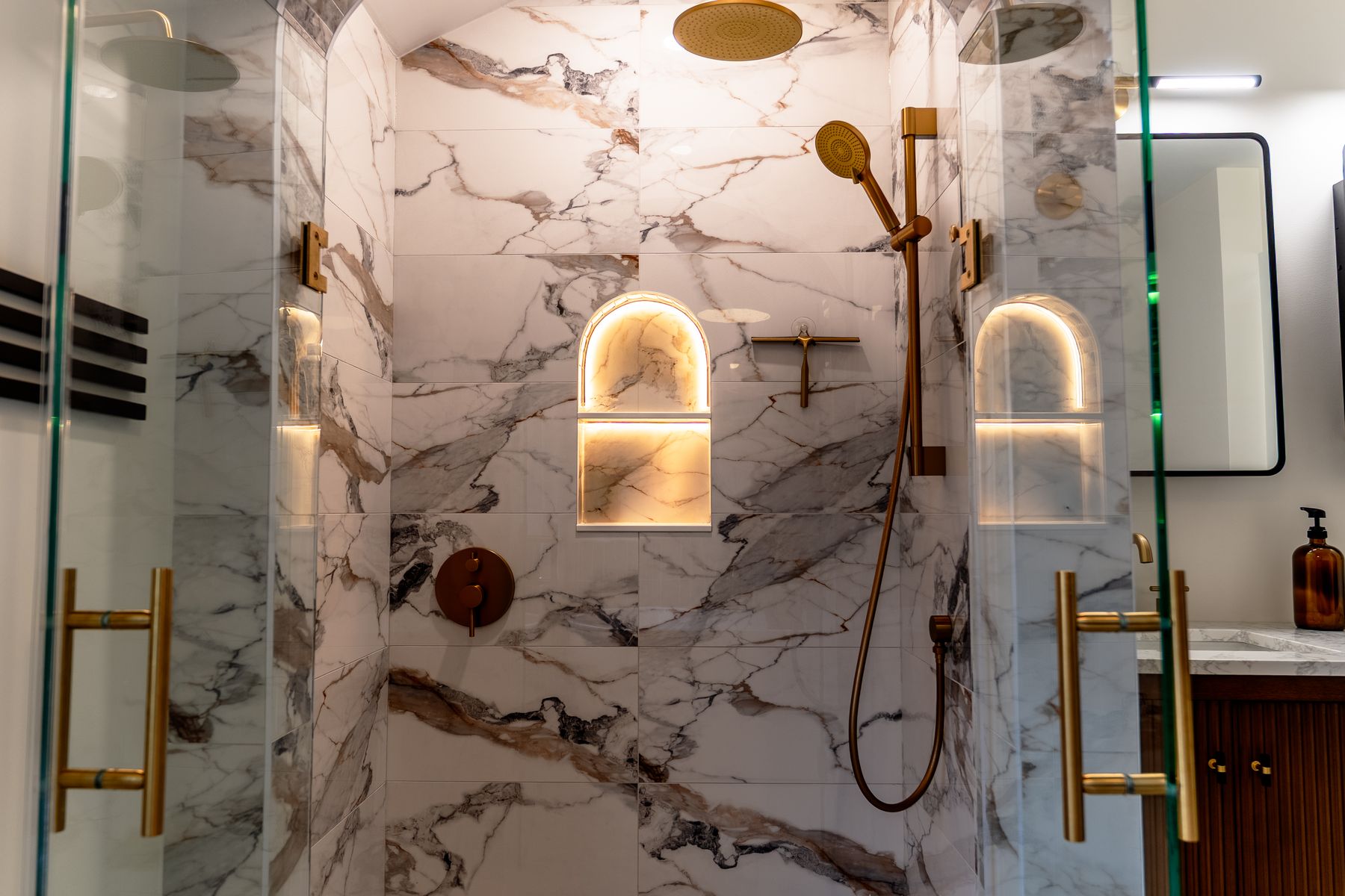 Marble bathroom renovation by Coronation Construction, photographed by Mike Mala