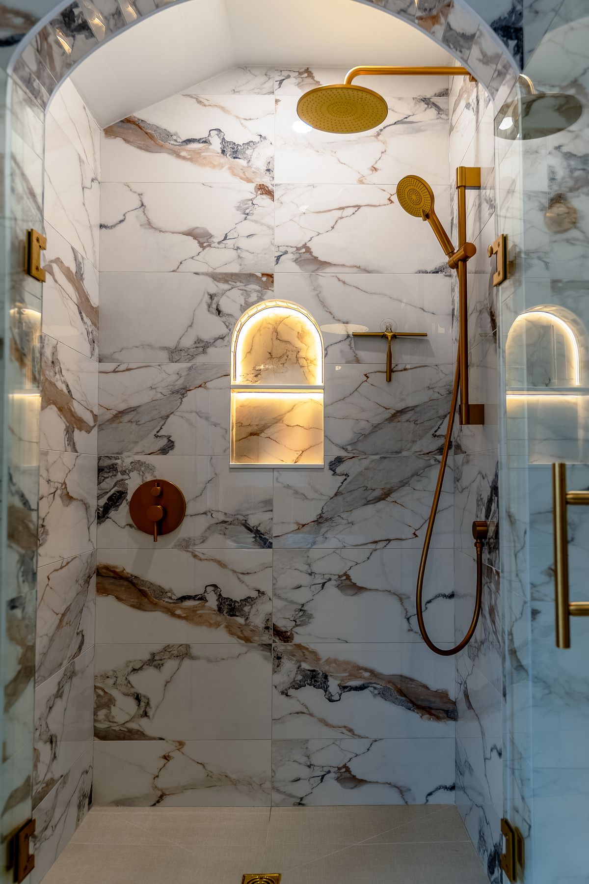 Marble bathroom renovation by Coronation Construction, photographed by Mike Mala