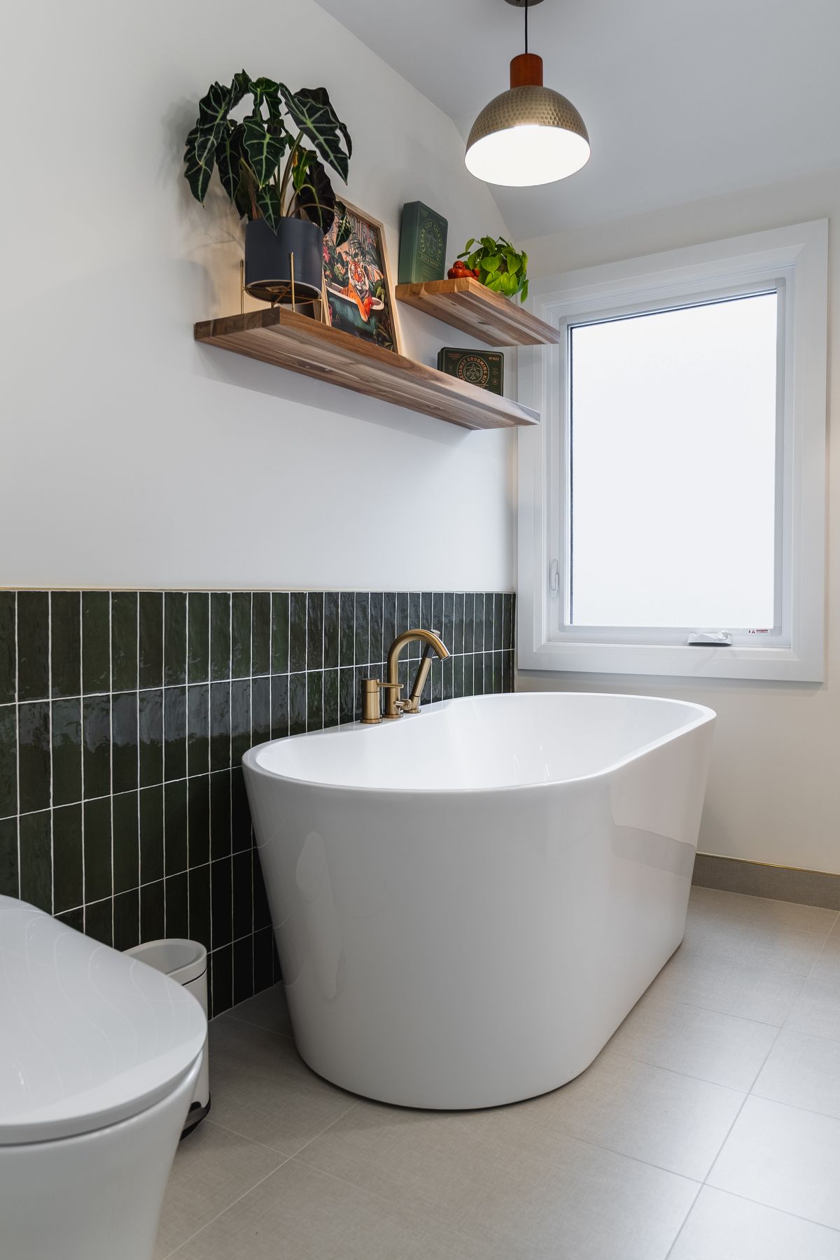 Marble bathroom renovation by Coronation Construction, photographed by Mike Mala