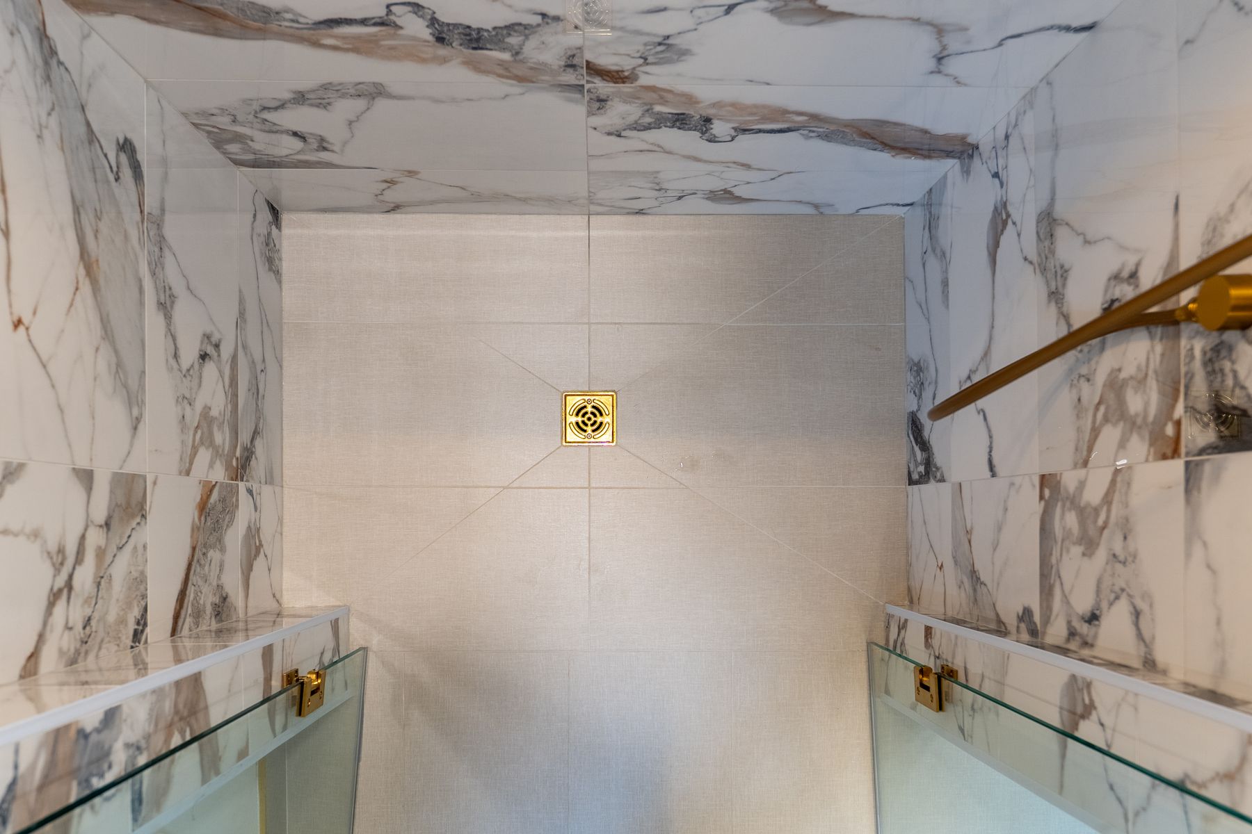 Marble bathroom renovation by Coronation Construction, photographed by Mike Mala