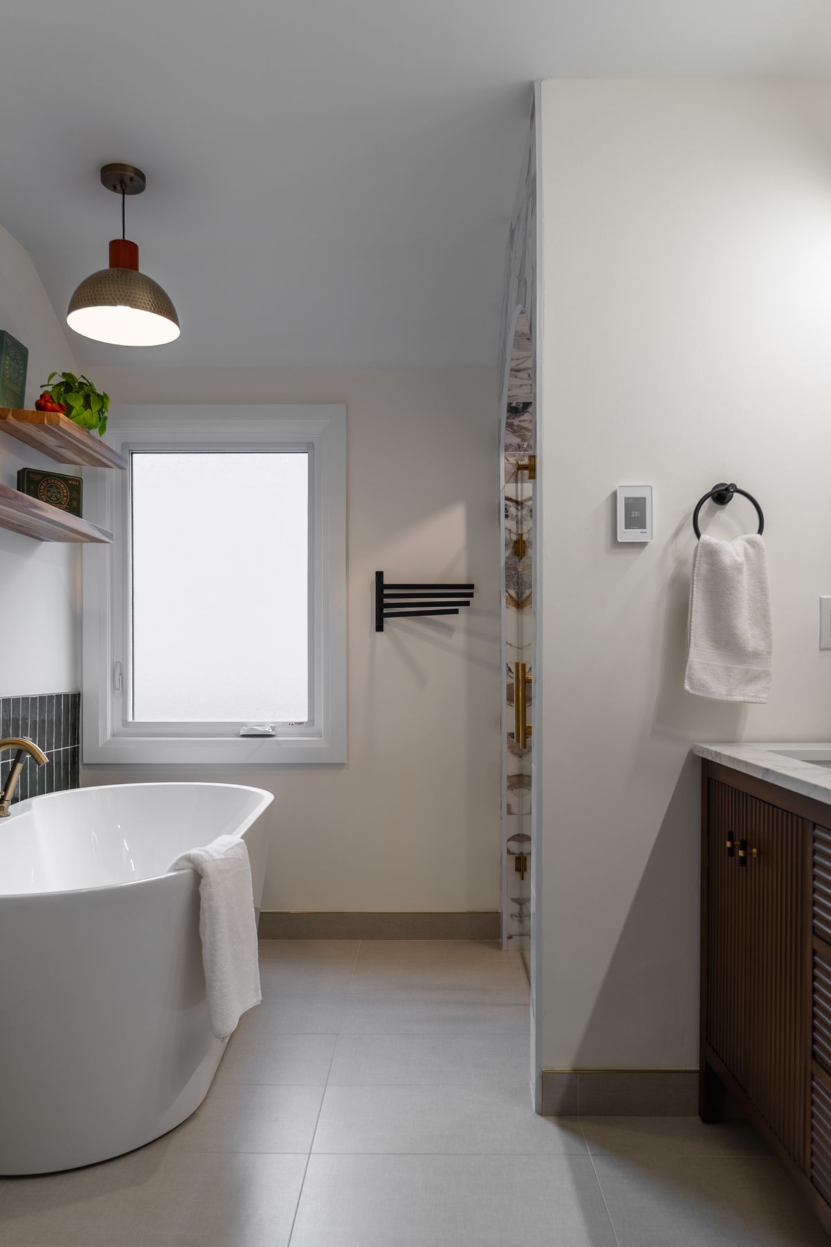 Marble bathroom renovation by Coronation Construction, photographed by Mike Mala