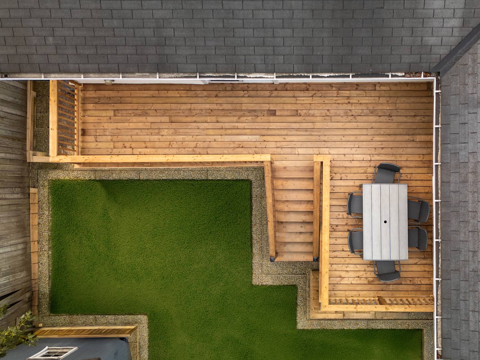 Aerial drone photo of a backyard deck build by Coronation Construction, photographed by Mike Mala