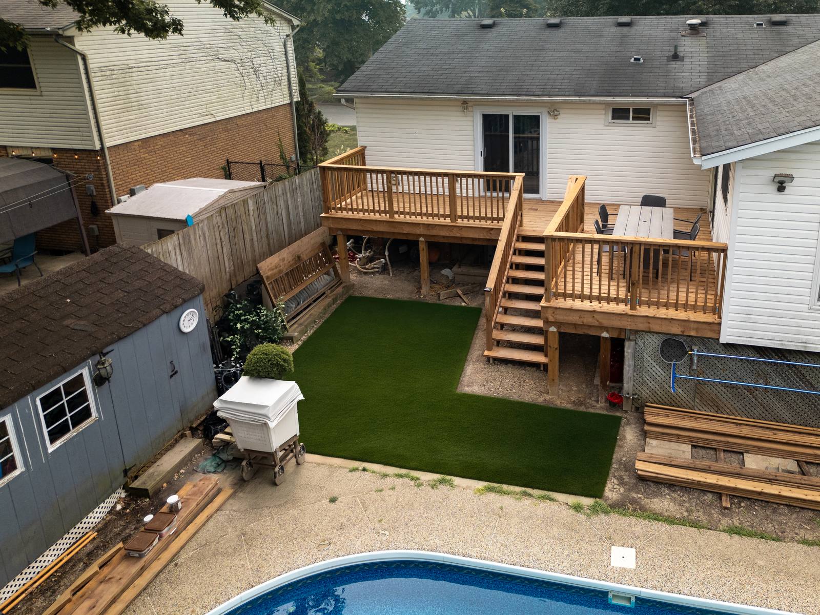 Aerial drone photo of a backyard deck build by Coronation Construction, photographed by Mike Mala