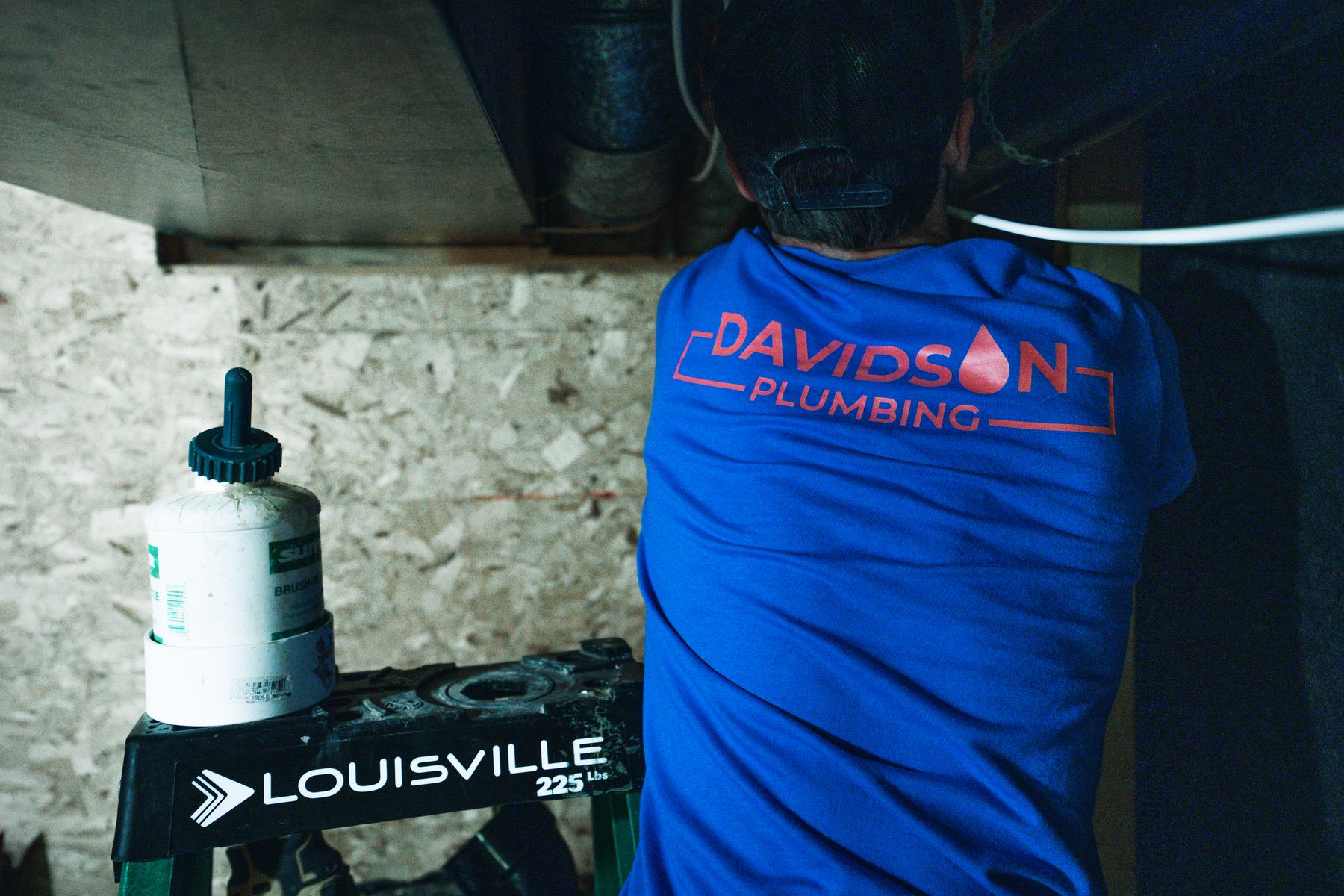 Davidson Plumbing crew on the job, photographed by Mike Mala